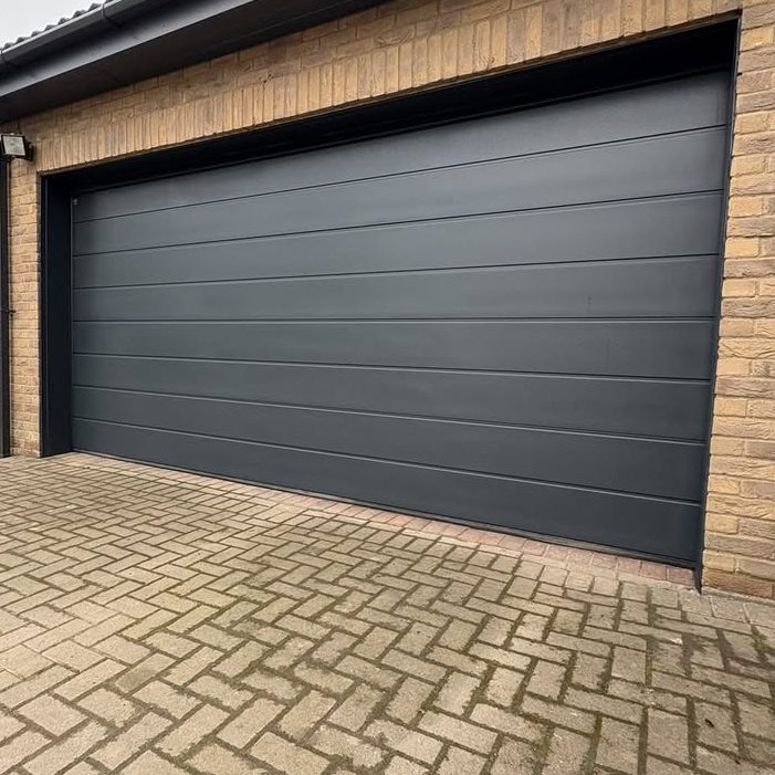 Commercial garage door spray painting Commercial garage door spray painting